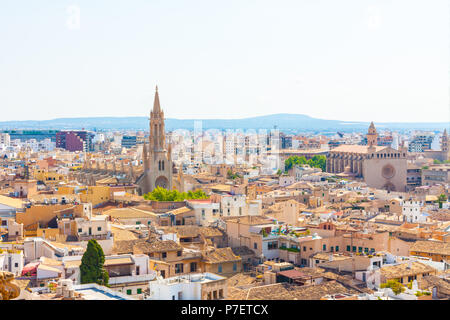 View over the rooftops and the Church of Santa Eulalia from  the terrace of the Cathedral of Santa Maria of Palma, also known as La Seu. Palma, Majorc Stock Photo