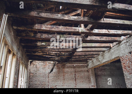 Wooden beam structure in the abandoned object. Stock Photo