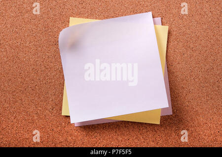 Various colors several sticky post notes on cork background Stock Photo