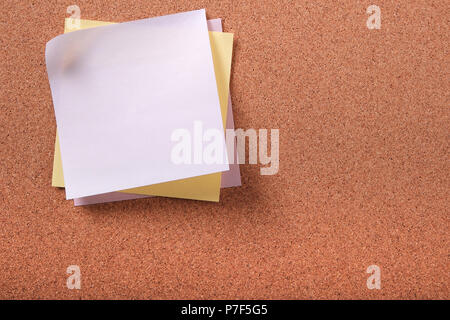 Various colors several sticky post notes on cork background Stock Photo