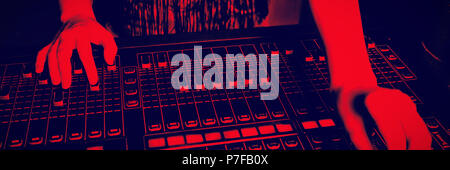 Mid section of audio engineer operating sound mixer Stock Photo