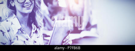 Creative business team working hard together Stock Photo