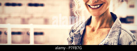 Pretty blonde designer smiling at camera Stock Photo