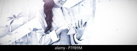 Stylish brunette working from home Stock Photo
