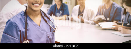 Medical student smiling at the camera during class Stock Photo