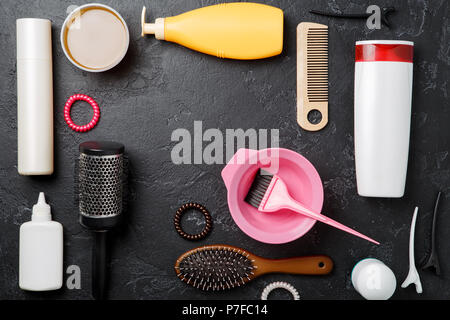 Picture of hairdresser accessories on black background Stock Photo
