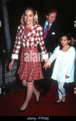 WESTWOOD, CA - JANUARY 24: (L-R) Actress Sharon Stone and guest attend the 'Shining Through' Westwood Premiere on January 24, 1992 at the Avco Center Cinemas in Westwood, California. Photo by Barry King/Alamy Stock Photo Stock Photo