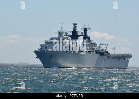 180629-N-XN177-0045 YOKOSUKA, Japan – The British Royal Navy Amphibious Assault Ship HMS Albion (L 14) arrives at U.S. Fleet Activities (FLEACT) Yokosuka for a scheduled port visit.  FLEACT Yokosuka provides, maintains, and operates base facilities and services in support of 7th Fleet’s forward-deployed naval forces, 71 tenant commands, and 27,000 military and civilian personnel.  (U.S. Navy photo by Mass Communication Specialist 1st Class Peter Burghart/Released) Stock Photo