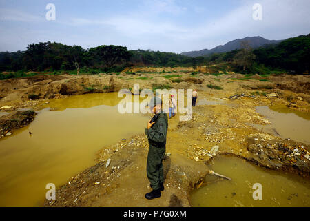 Tocuyito, Carabobo, Venezuela. 30th Apr, 2018. May 03, 2018. Military officers, members of the golden lightning operation, consisting in its entirety by 1200 men make a tour of the El Torito mine, where gold prospectors caused destruction of trees and in general a great damage of ecological impact, in the Libertador municipality of the Carabobo state. Photo: Juan Carlos Hernandez Credit: Juan Carlos Hernandez/ZUMA Wire/Alamy Live News Stock Photo