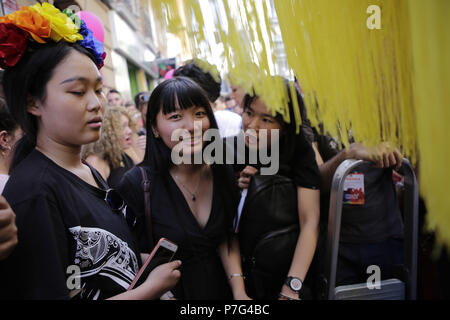 Madrid, Madrid, Spain. 5th July, 2018. Tourists from Japan attend the high-heeled race.The high heels race is one of the activities that toke place during the LGBT gay pride festivals in the Chueca neighborhood, Madrid. Credit: Mario Roldan/SOPA Images/ZUMA Wire/Alamy Live News Stock Photo