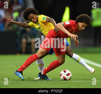 Kazan, Russia. 6th July, 2018. Willian (L) of Brazil vies with Axel Witsel of Belgium during the 2018 FIFA World Cup quarter-final match between Brazil and Belgium in Kazan, Russia, July 6, 2018. Credit: Du Yu/Xinhua/Alamy Live News Stock Photo