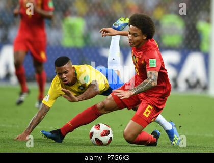 Kazan, Russia. 6th July, 2018. Gabriel Jesus (L) of Brazil vies with Axel Witsel of Belgium during the 2018 FIFA World Cup quarter-final match between Brazil and Belgium in Kazan, Russia, July 6, 2018. Credit: Du Yu/Xinhua/Alamy Live News Stock Photo
