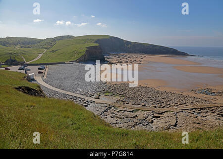 Dunraven bay or Southerndown bay near Bridgend with its pebbled shore and high cliffs with ample walkways and a walled garden to walk round. Stock Photo