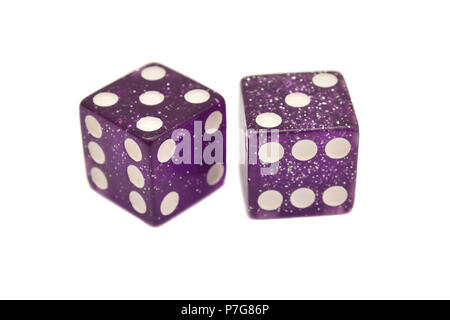 a pair of purple casino dice isolated on white Stock Photo