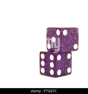 a pair of purple casino dice isolated on white Stock Photo