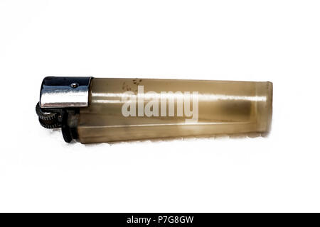 Close up of an old vintage Cigarette  lighter isolated on a white surface. Stock Photo