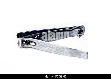 Close up of an stainless steel's Nail cutter isolated on a white surface. Stock Photo