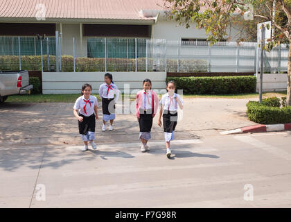 Students of Lycee De Vientiane crossing Avenue Lane Xang, Vientiane, Laos, Asia. Stock Photo