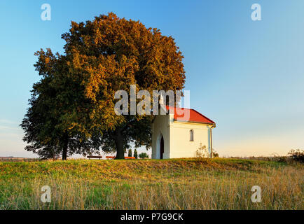 Lone Chapel on field Stock Photo