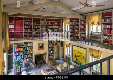 Modernised double height mezzanine library in 18th century chateaux, St Remy de Provence Stock Photo