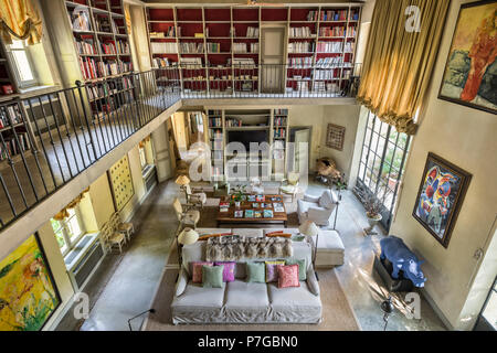 Modernised double height mezzanine library in 18th century chateaux, St Remy de Provence Stock Photo