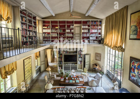 Modernised double height mezzanine library in 18th century chateaux, St Remy de Provence Stock Photo