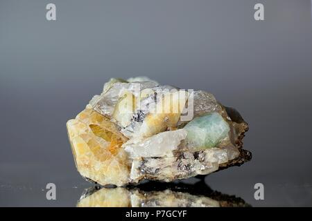 Crystals of topaz on a quartz matrix from Viitaniemi pegmatite quarry, Finland Stock Photo