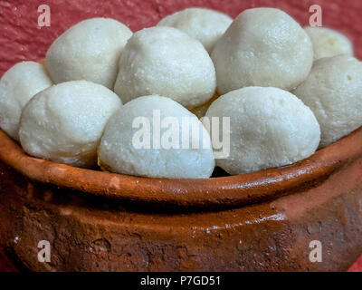 Indian Sweet Rasgulla Also Know as Rosogolla, Roshogolla, Rasagola, Ras Gulla is a Syrupy Dessert Popular in India. Selective focuse is used. Stock Photo