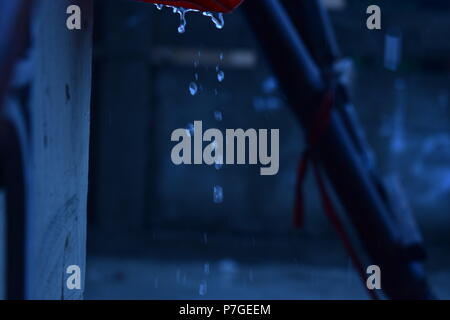 Water Drops Falling Down Stock Photo
