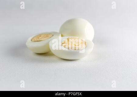 Boiled Eggs Cut in Half On White Background Isolated Stock Photo