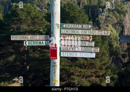 Nine different signs on the one street signpost in Bowral, NSW New South Wales, Australia Stock Photo