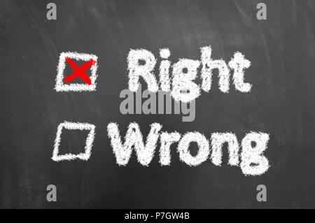 Right wrong chalk text and check box on blackboard or chalkboard as good right decision answer concept Stock Photo