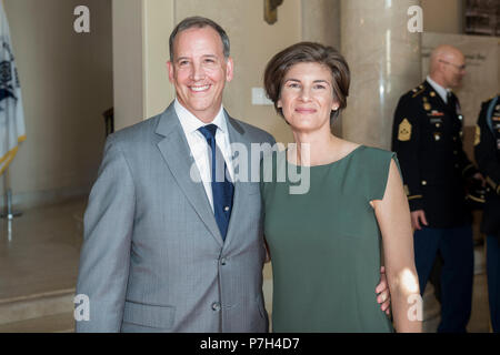 Gerald O’Keefe (left), Administrative Assistant to the Secretary of the Army; and Katharine Kelley (right), superintendent, Arlington National Cemetery; pose for a photo in the Memorial Amphitheater Display Room at Arlington National Cemetery, Arlington, Virginia, June 29, 2018. (U.S. Army photo by Elizabeth Fraser / Arlington National Cemetery / released) Stock Photo