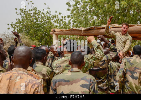 U.S. Army Spc. Travis Flynn, assigned to Alpha Company, 1st Battalion ...