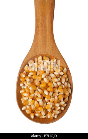 Corn kernels in a wooden spoon isolated on white background Stock Photo