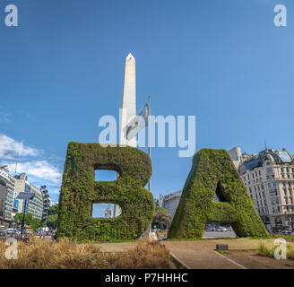 Buenos Aires Sign and Obelisk at Plaza de La Republica - Buenos Aires, Argentina Stock Photo