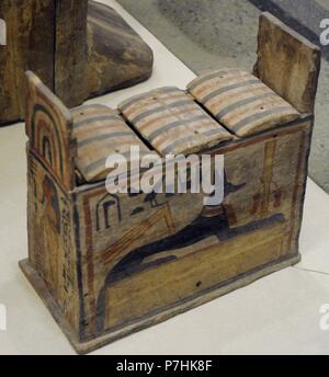 Box containing shawabti. The wooden box is decorated with paintings of different deities. Tomb of Ahmose priest. The State Hermitage Museum. St. Petersburg. Russia. Stock Photo