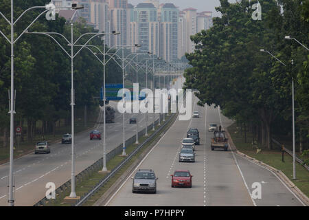 Busy street scenes and modern urban daily life in Putrajaya a city south of Malaysia's capital Kuala Lumpur. Stock Photo