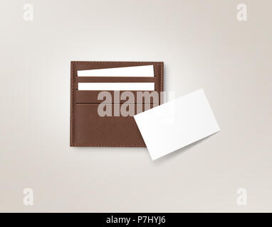 Brown leather card holder with blank white card mock up isolated on grey. Business credit cards mockup in sleeve cardholder pocket. Clear paper employ Stock Photo