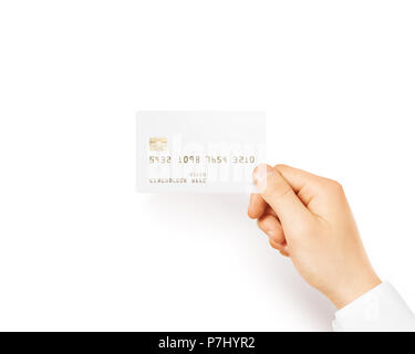 Hand holding blank white credit card mockup isolated. Empty plastic card mock up hold in arm. Clear surface bank card with electronic chip. Debit card concept design presentation template. Stock Photo