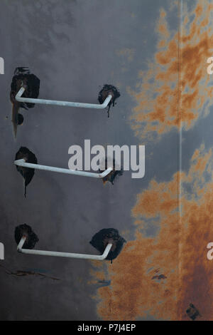 A rusty stairs on a boat landing construction Stock Photo