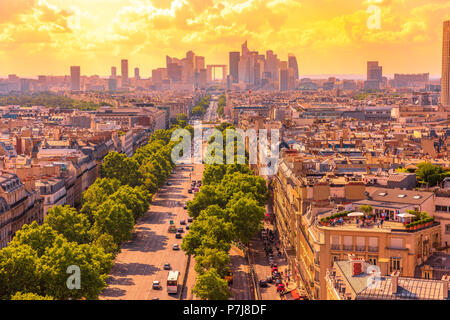 Place Charles de Gaulle square panorama at sunset from Arc de Triomphe top terrace with Paris skyline in France, Europe. Scenic urban cityscape. Stock Photo