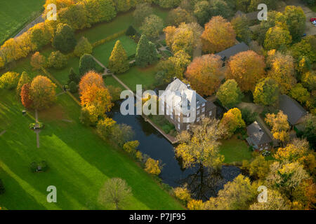 Haus Wohnung' moated castle in autumnal park, Voerde, Ruhr area Stock Photo