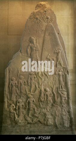 Victory stele of Naram-Sin, King of Akkad. It celebrates the triumph of King Naram-Sin over a mountain people, over Satun, King of the Lullubi. The Akkadian army is climbing the steep slopes of the Zagros Mountains. Mesopotamia. Sipar. Akkadian period, c. 2250 BC. Louvre Museum. Paris, France. Stock Photo