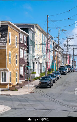 Jellybean Row or colourful houses on the corner of Gower Street and Prescott Street in St John's, Newfoundland Stock Photo