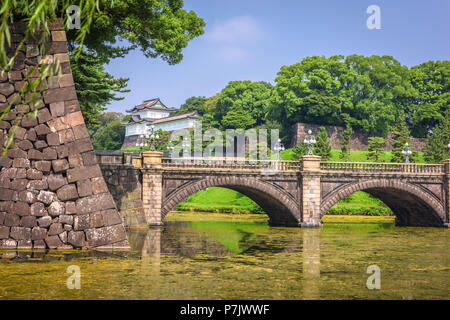 Tokyo, Japan at the Imperial Palace moat and bridge. Stock Photo