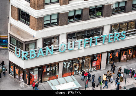 New York City, USA - April 7, 2018: Aerial view of urban outfitters retail clothing store sign building in NYC Herald Square Midtown closeup Stock Photo