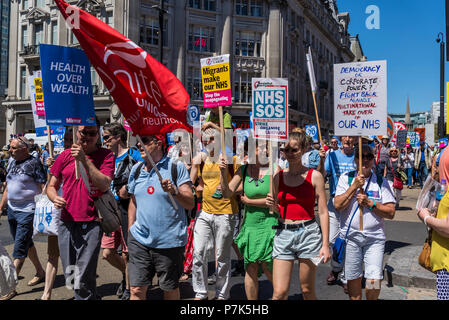 NHS 70th Anniversary March organised by People's Assembly, NHS SOS placard, London, UK, 30/06/2018 Stock Photo