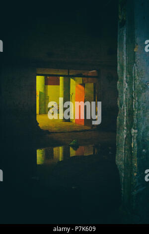 An old huge window in now used as entrance in a condemned abandoned ...