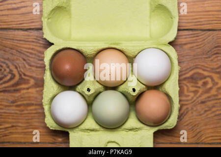 six different eggs in a carton Stock Photo